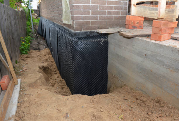 Happy homeowners after waterproofing job in New Bremen